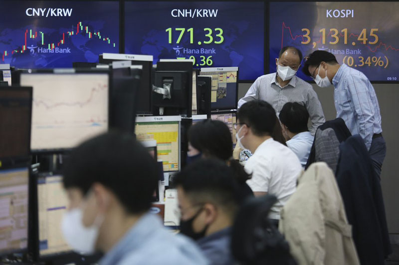 Asian stocks mixed after Wall St rally on economic optimism