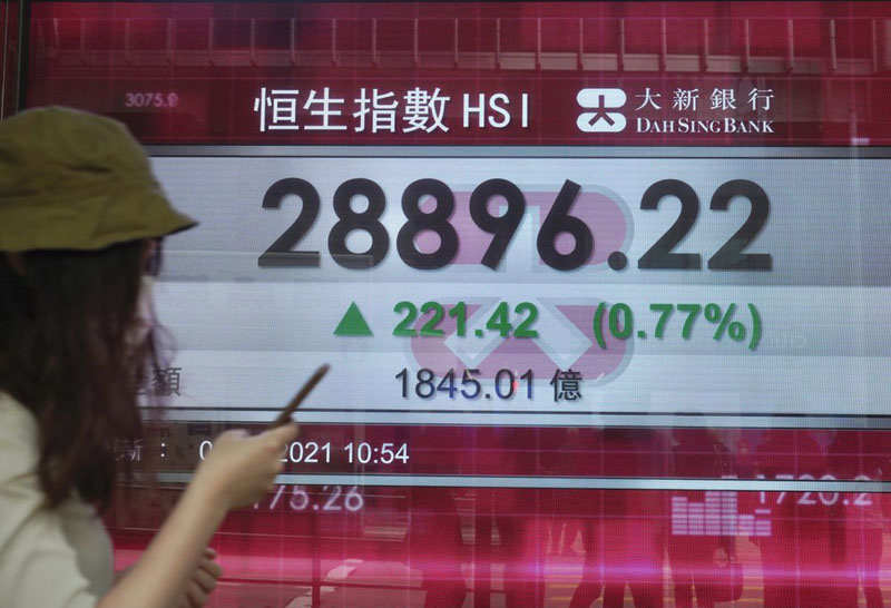 Asian shares mostly higher after S&P record high