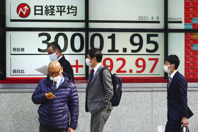 Asian shares mostly lower on strong China price data