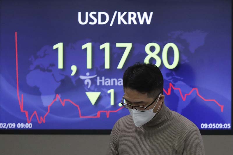 Asian stocks higher after Wall Street rises to new record