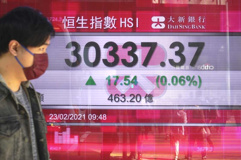 Asian shares mixed amid vaccine optimism, US tech sell-off