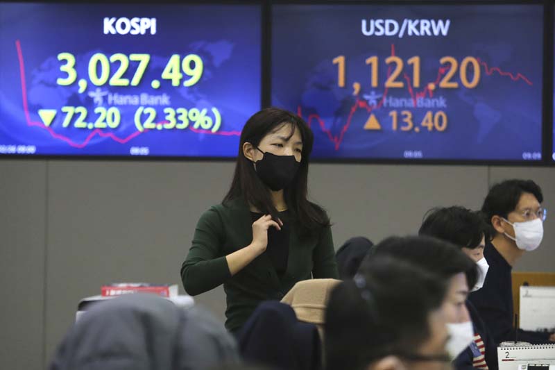 Asian shares mixed after US stock fall ahead of Fed meeting