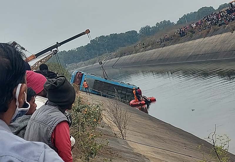 Bus drives off bridge into canal in central India; 40 dead