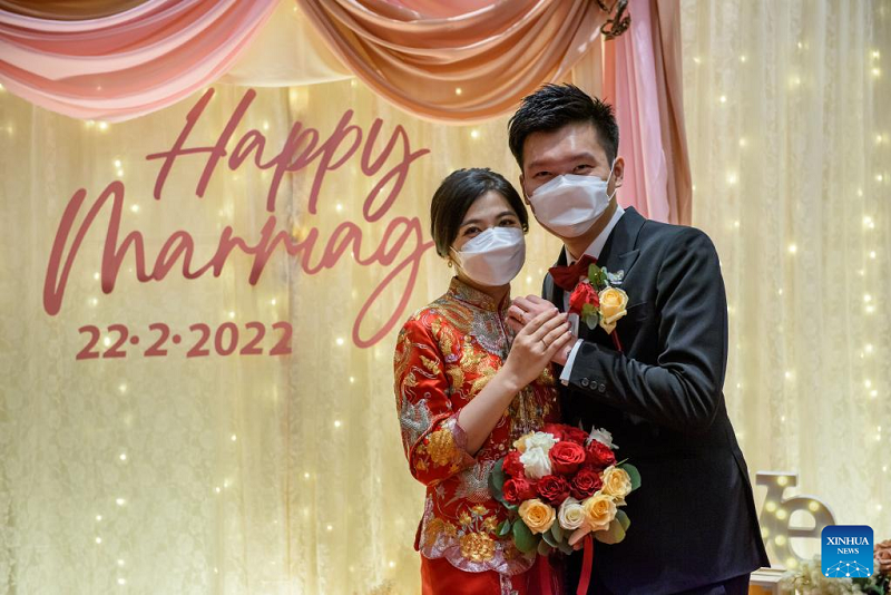 Couples across world get married on 2-22-2022 for good wishes