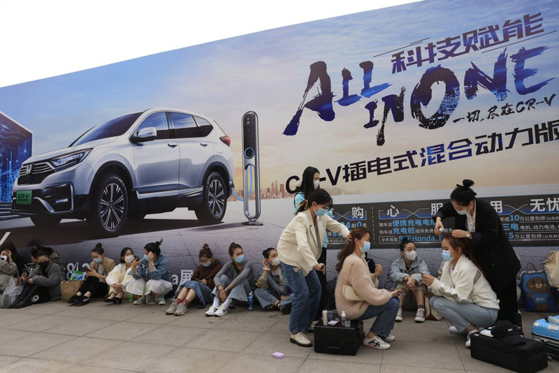 VW, Ford unveil SUVs at China auto show under virus controls