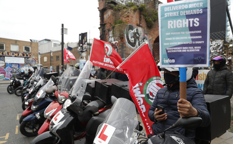 UK Deliveroo riders strike over pay, gig work conditions