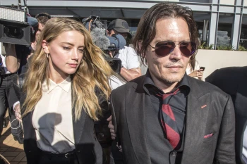 Australian prosecutors drop case against actor Amber Heard