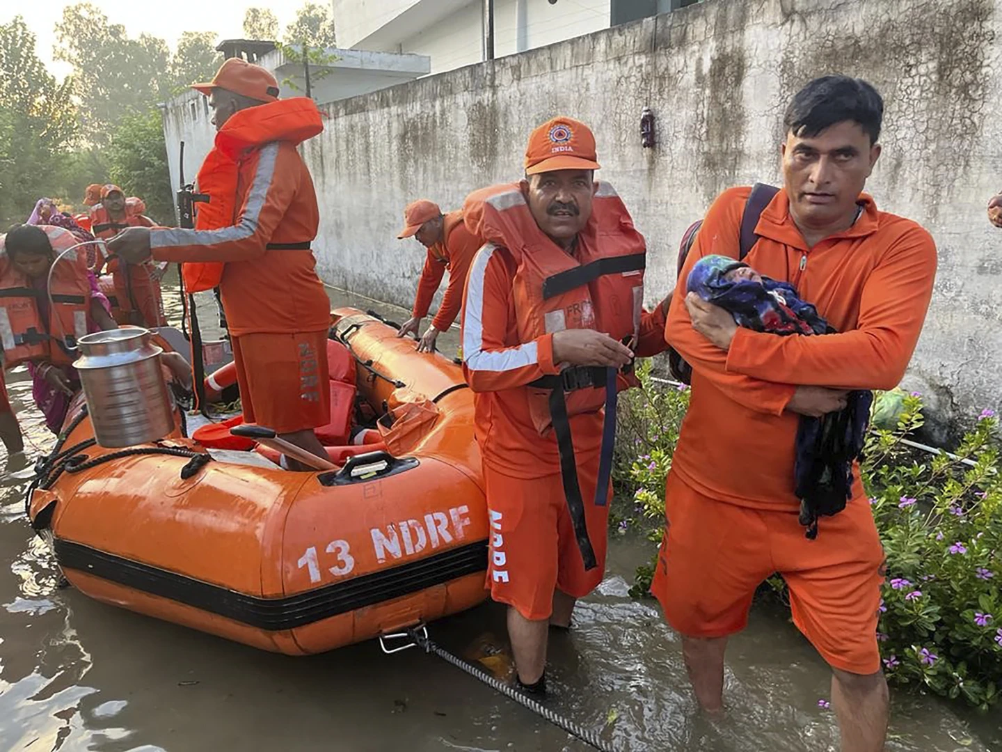 Heavy rain and landslides have killed at least 72 people