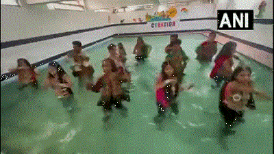 People in Udaipur perform Garba in swimming pool