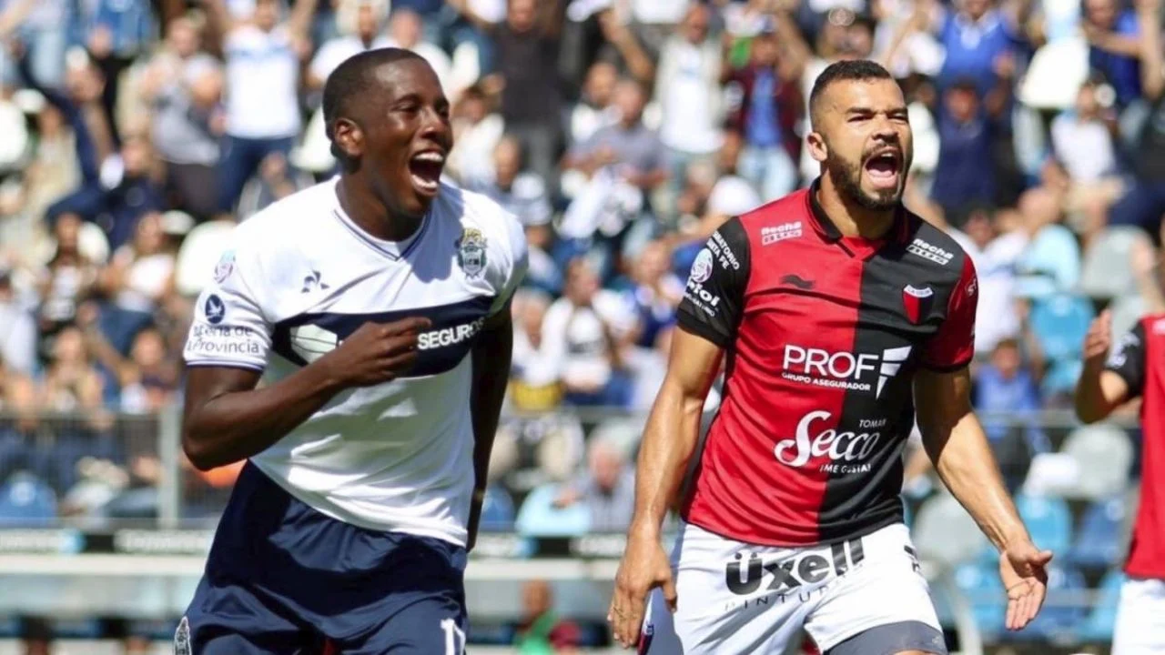 Colon beat Gimnasia to go top