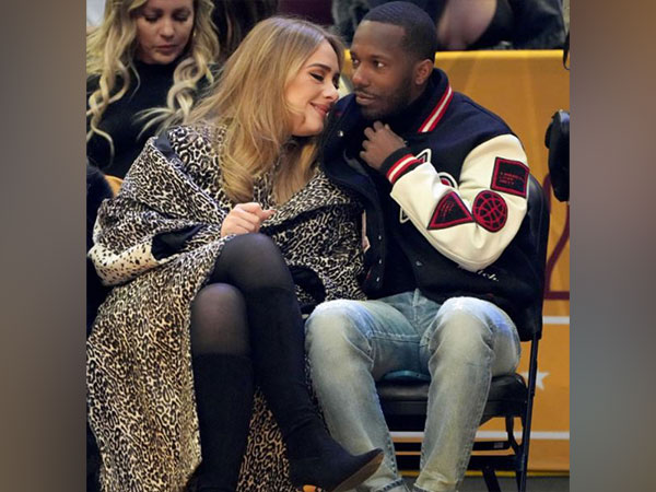 Adele gets cozy with boyfriend at NBA All-Star game