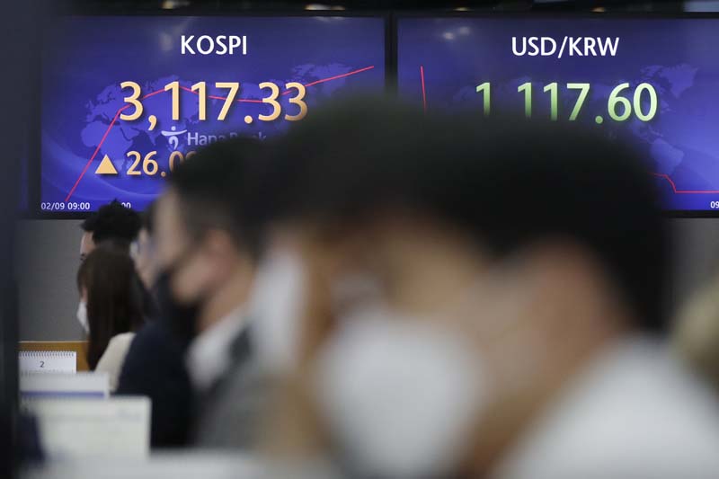 Global stocks mixed on optimism over recovery, stimulus