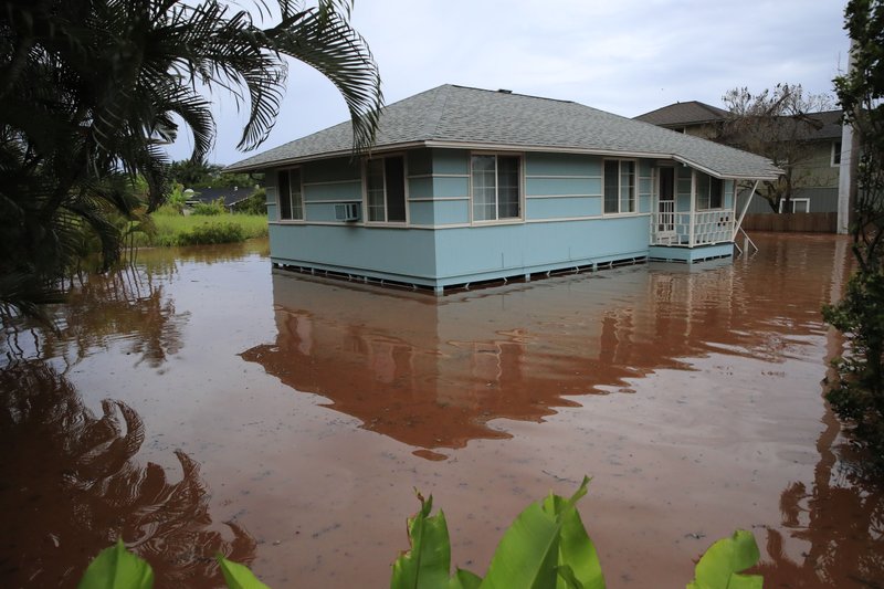 Town north of Honolulu evacuated as stream floods