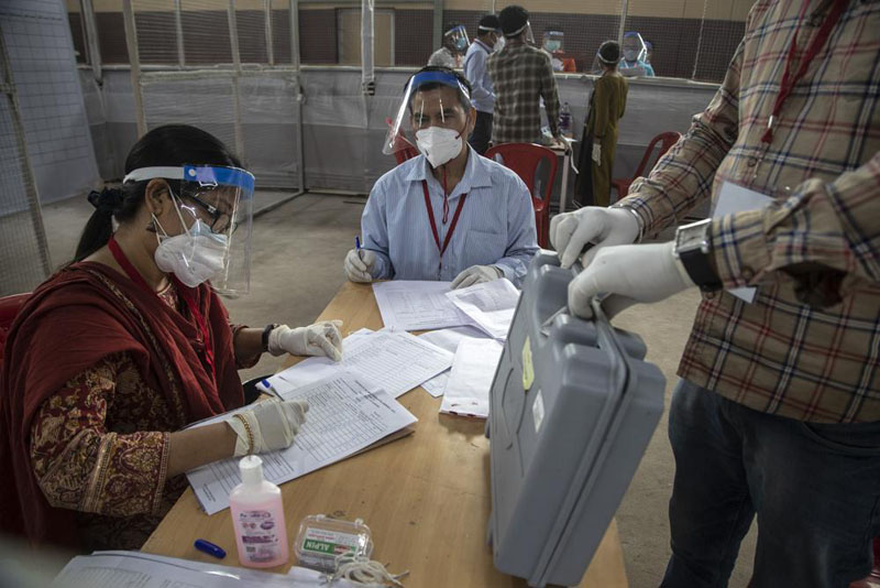 Indian leader’s party takes electoral hit amid virus surge