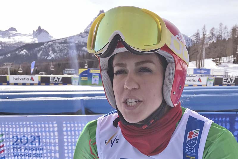 Barred from travel by husband, Iran ski coach works remotely