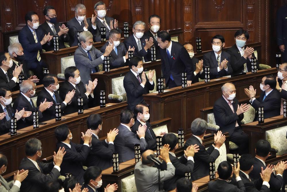 Japan’s Parliament elects former diplomat Kishida as new PM