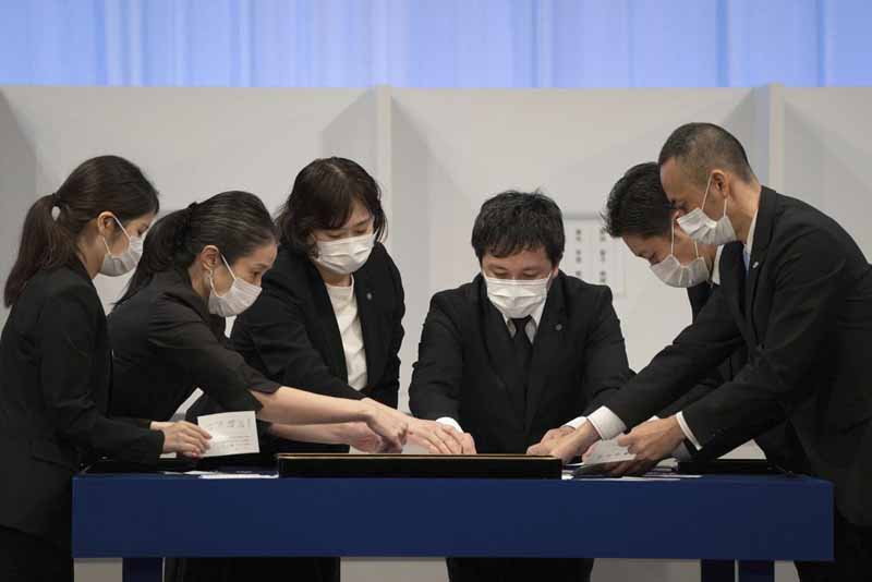 Japan’s ruling party votes for new leader in 2nd round