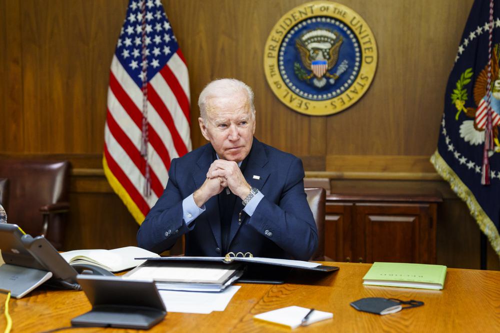 Biden warns Putin of ‘severe costs’ of invasion