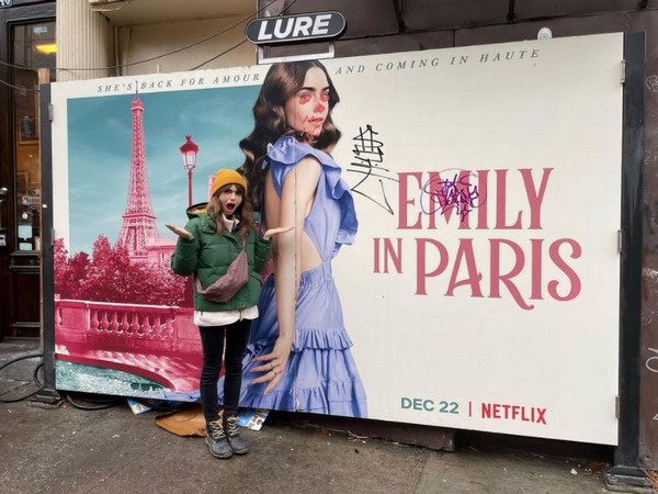 Lily Collins reacts to the poster of ‘Emily in Paris’