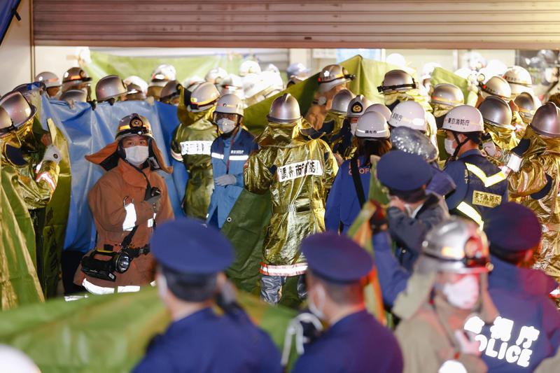 Man with knife injures 17 on Tokyo train, starts fire