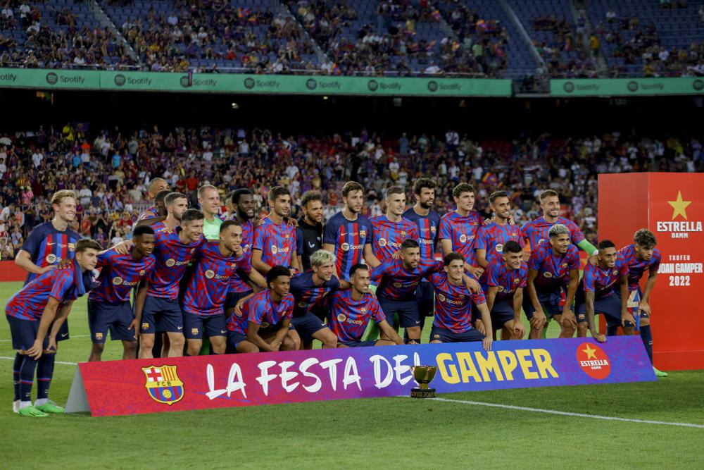 Barcelona’s Robert celebrates after scoring a goal