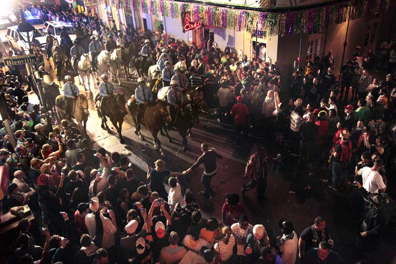 Muted Mardi Gras: Closed bars, barricaded Bourbon Street