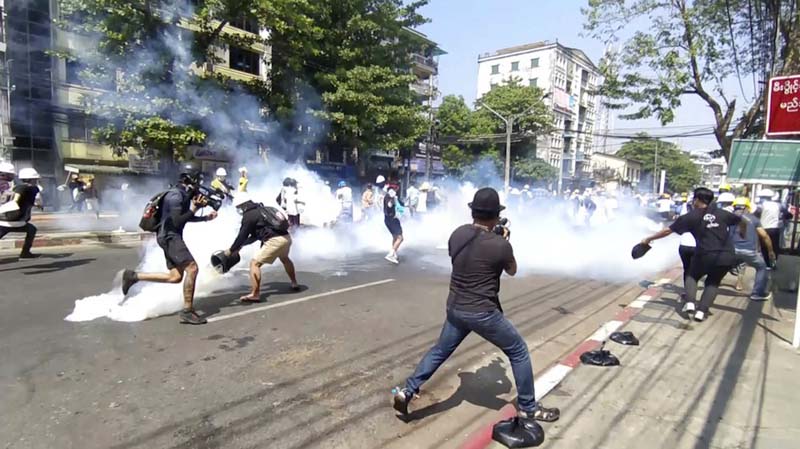 Defying deadly crackdown, crowds again protest Myanmar coup