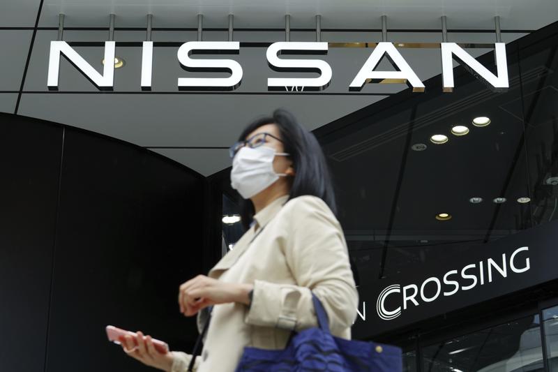 Nissan sees smaller loss, promises sales recovery