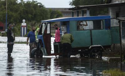 Hurricane brushes Puerto Vallarta, heads up Mexico coast