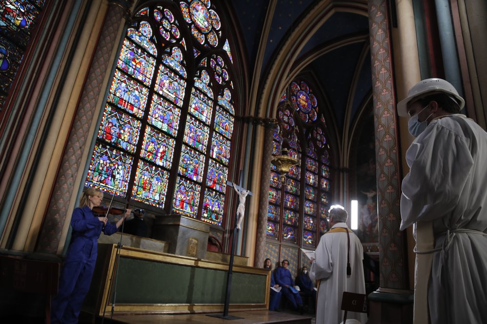 Holy Thursday service held at fire-ravaged Notre Dame