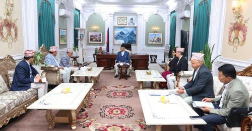 EC office-bearers discuss by-election preparation with PM Oli