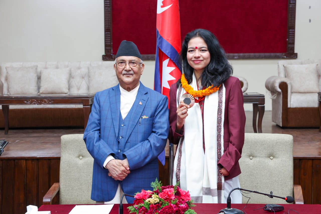 PM Oli honours Palesha, announces Rs 6.5 million prize