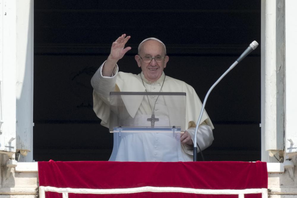 The Latest: Pope appears in video promoting vaccination