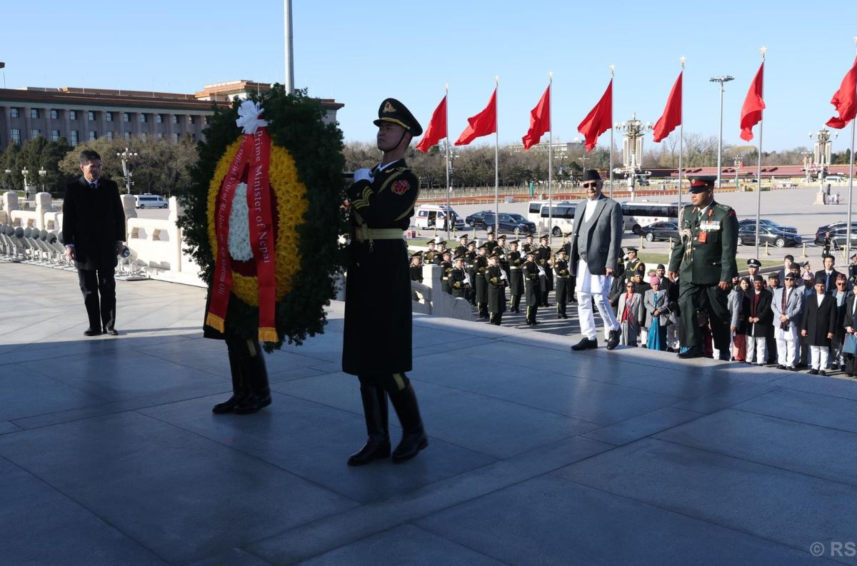 PM Oli lays wreath at Martyrs’ Monument in China