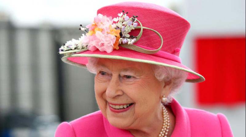 Britain’s queen calls vaccine ‘quite harmless’