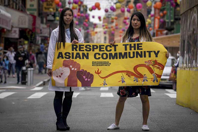 Asian American health workers fight virus & racism