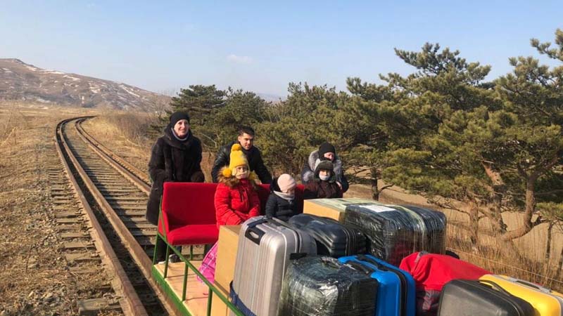 Russian diplomats return from North Korea on rail trolley