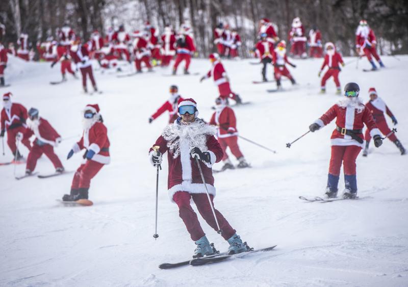 Skiing Santas shred Maine slopes for charity