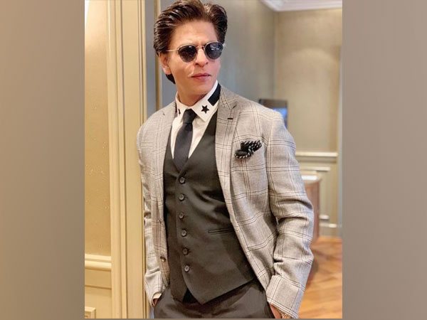 Shah Rukh Khan sports rugged look, says time to get back to work