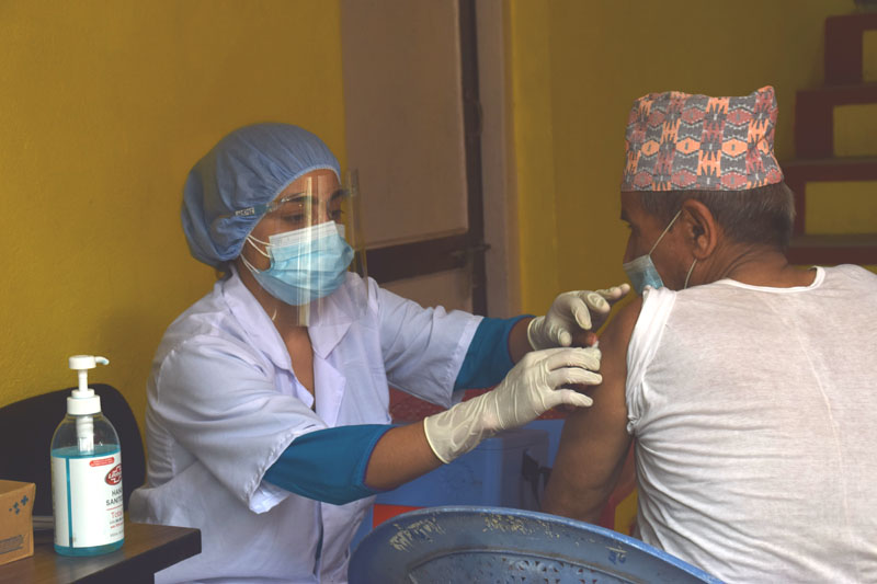 People being vaccinated against COVID-19 in Kathmandu