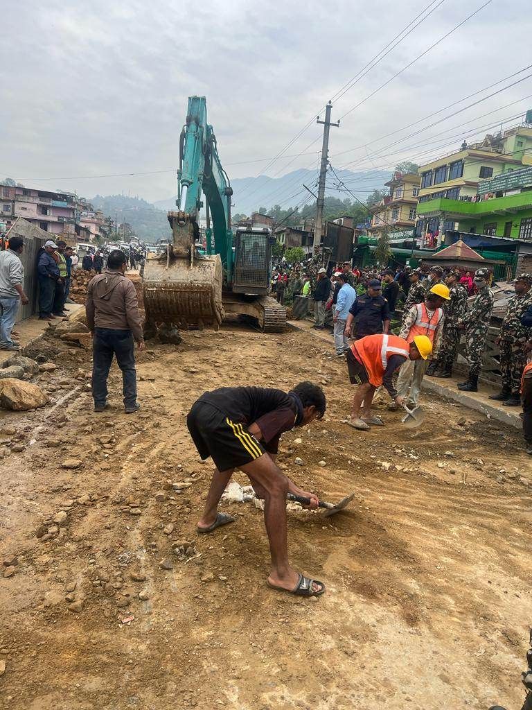 Vehicles in motion, one lane at a time in Dhading