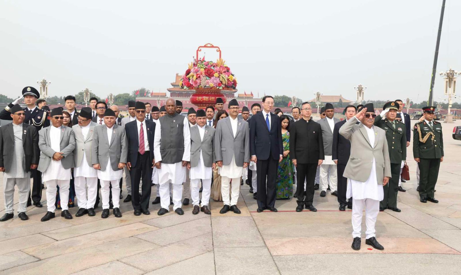 PM Dahal Presents Bouquet at Chinese Monument