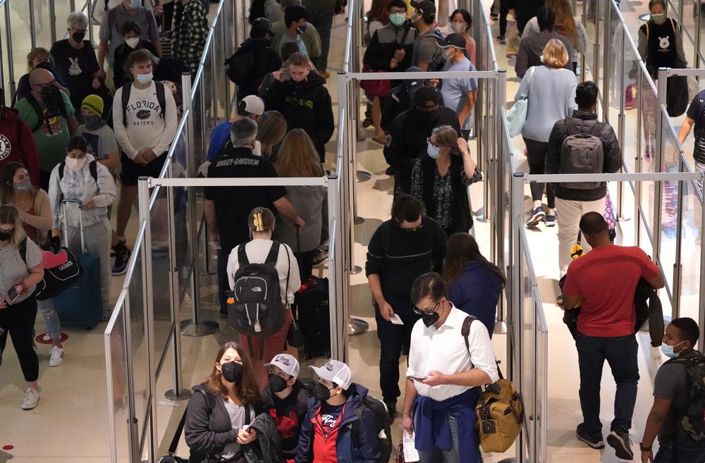 2,500 US flights canceled due to storms, virus