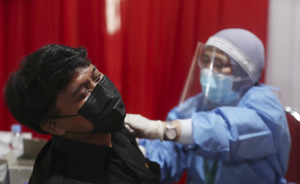 WHO warns fresh surge of virus variants in Indonesia